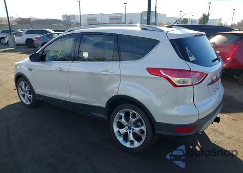 2014 Ford Escape Titanium z USA, uszkodzony, nr VIN 1FMCU9J92EUB16573